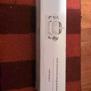 Multifunctional charging station for quest 2